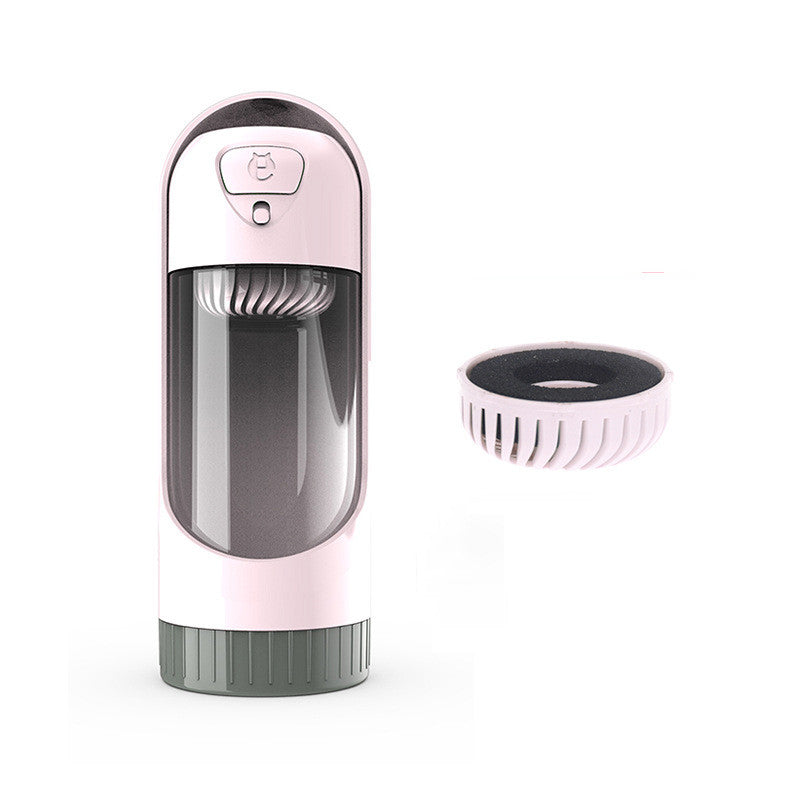 Wagivo portable dog water bottle being used at dog park by golden retriever